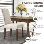 Sedie da pranzo in tessuto di lino beige con schienale borchiato, gambe in legno massello - Set da 2